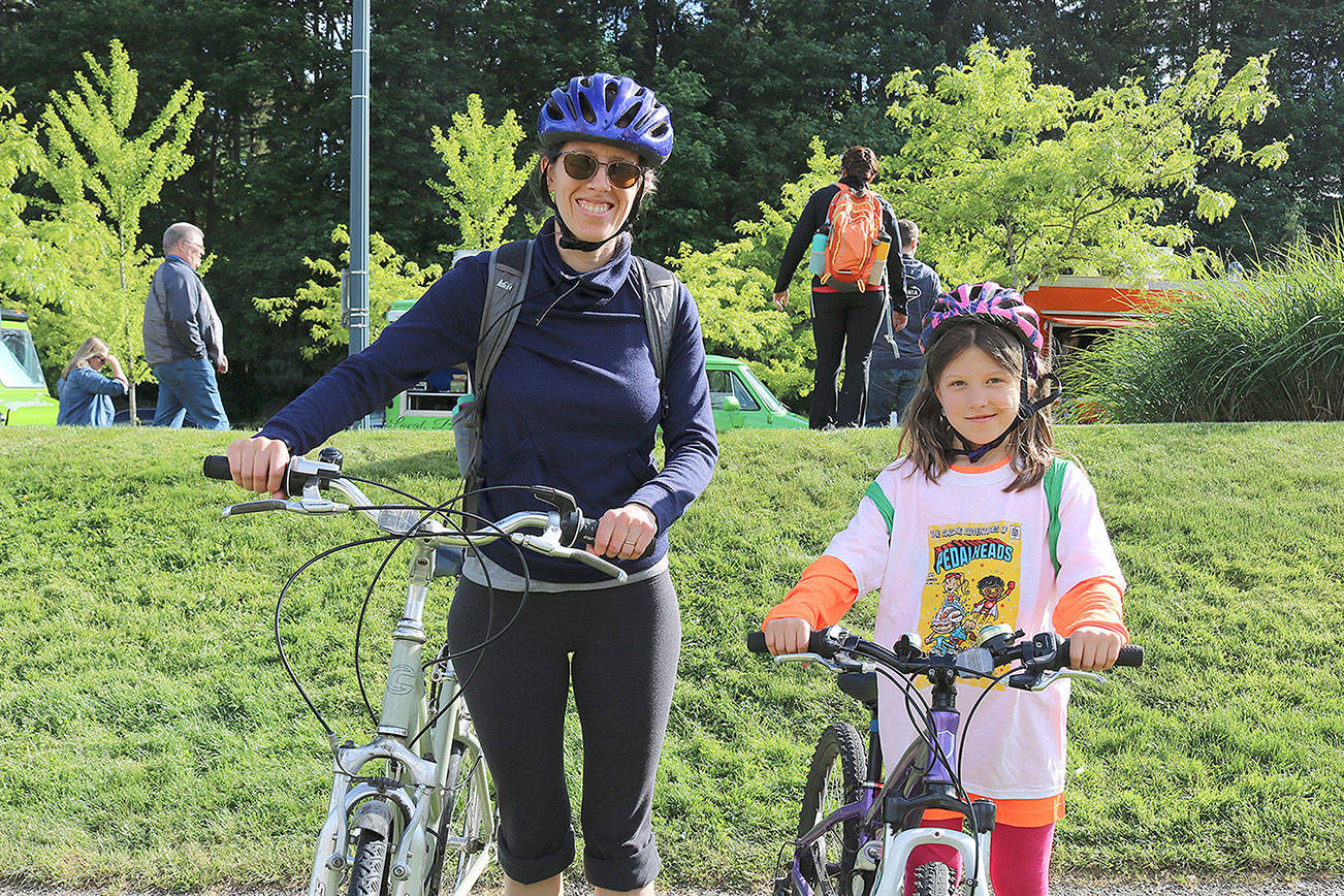 Redmond residents Nicole (left) and daughter Clara, 8 seen at the 2019 Bike Bash on May 17. This is their fourth year attending the event. Stephanie Quiroz/staff photo