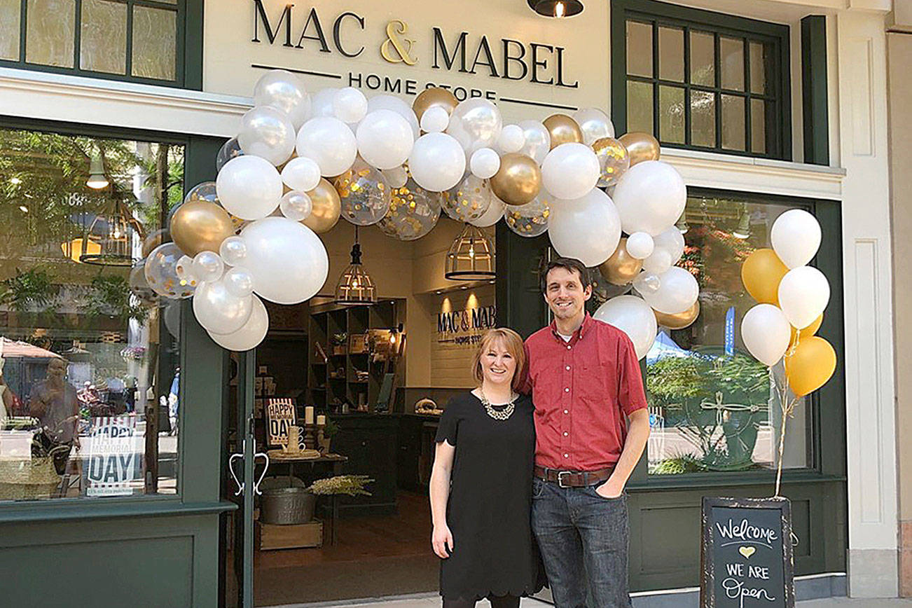 Owners Keri and Peter Crossely outside of their store Mac & Mabel, located on the ground level at Redmond Town Center. Photo courtesy of Mac & Mabel Facebook