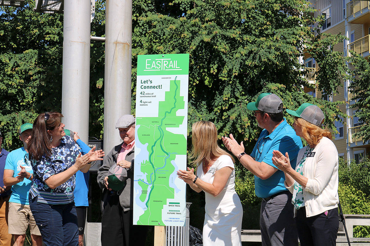 Elected officials and community leaders unveiled Eastrail, the new name of the emerging 42-mile multipurpose trail on July 20 in Redmond. Stephanie Quiroz/staff photo