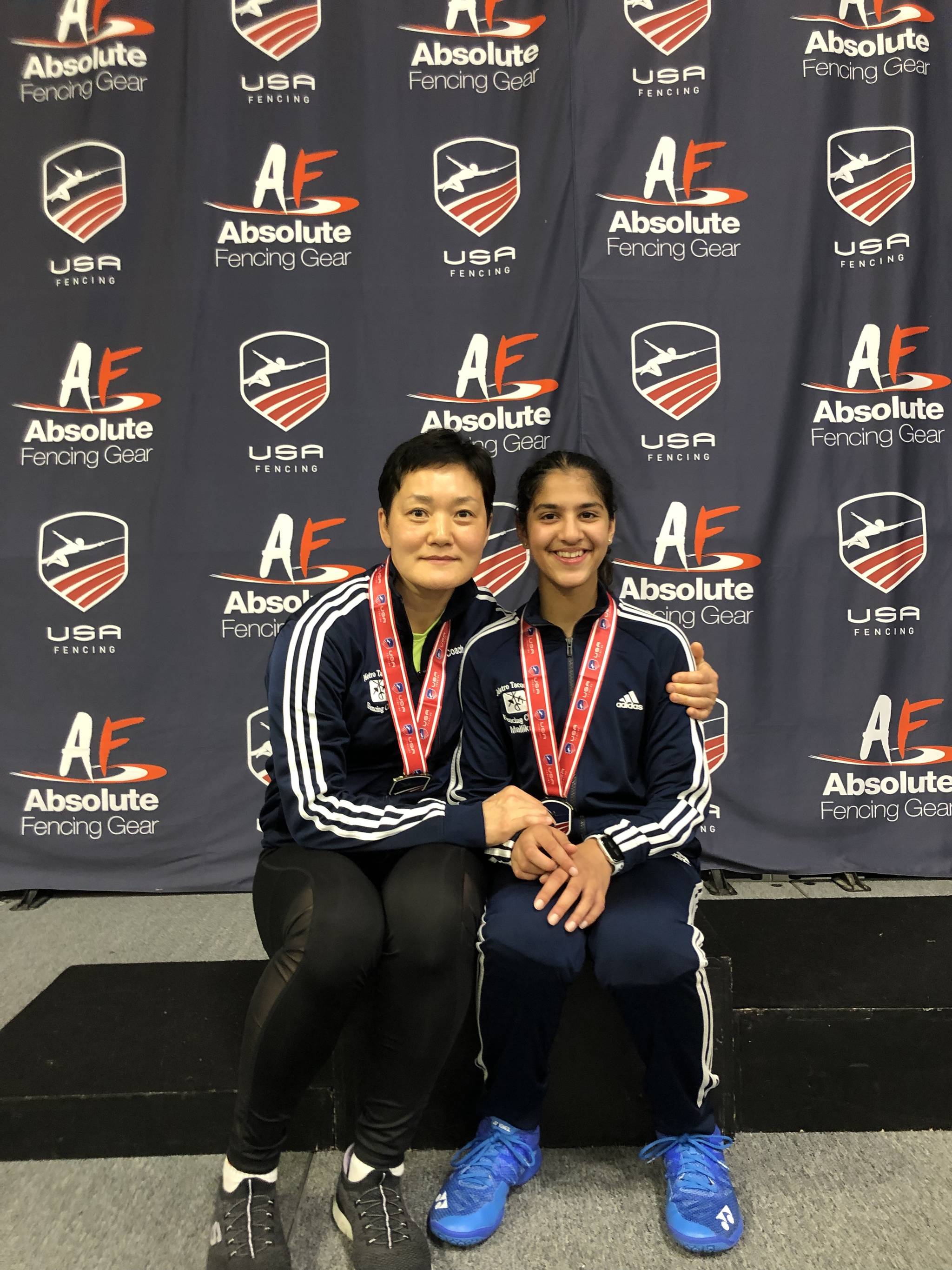 Twin sisters represent Redmond fencing academy at premier events