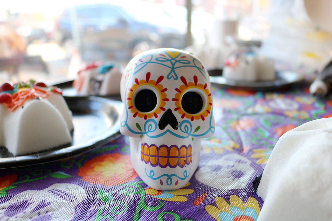 Attendees decorated sugar skulls at the Día de los Muertos event at the Centro Cultural Mexicano in Redmond on Nov.2. Stephanie Quiroz/staff photo