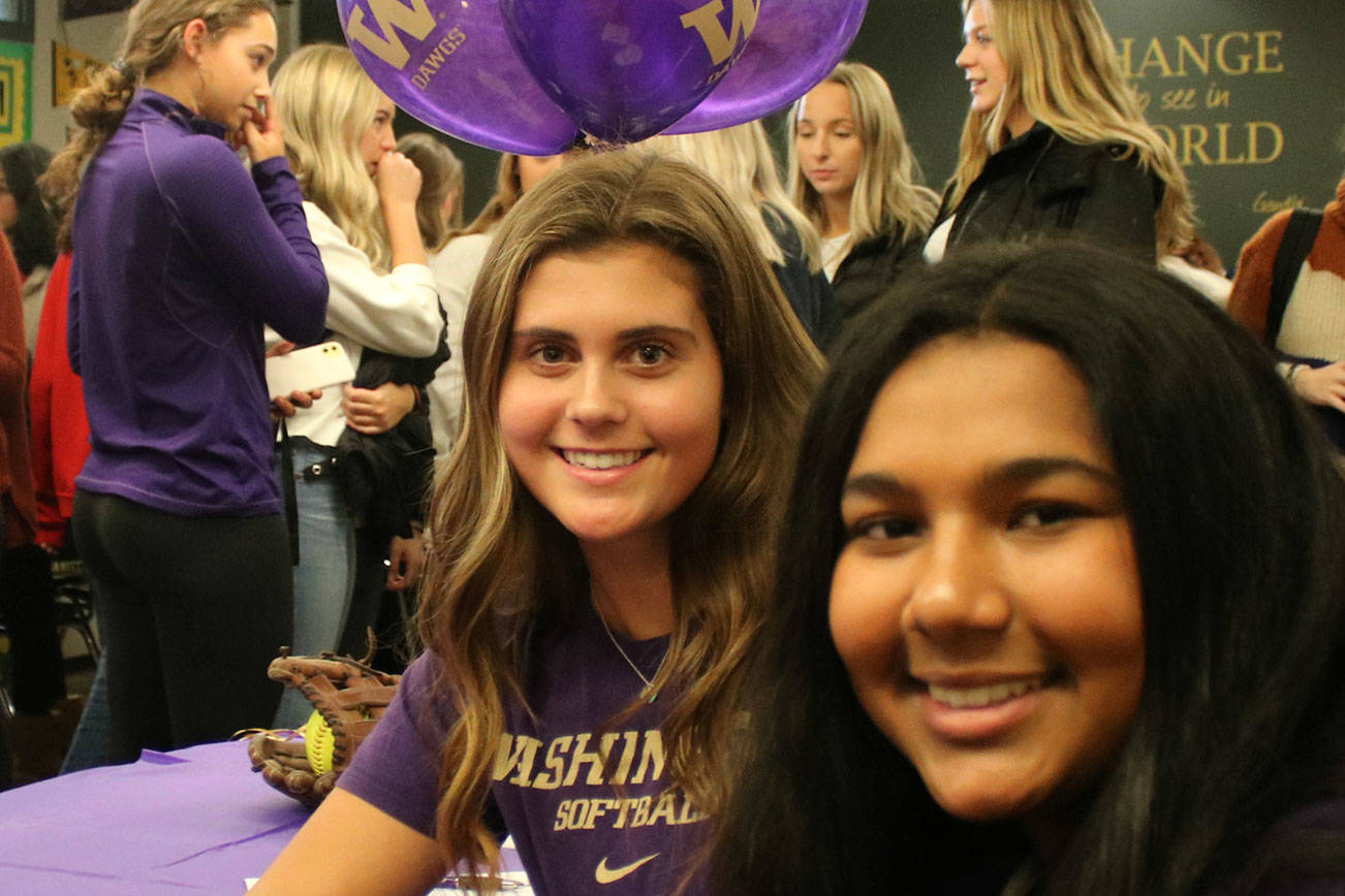 University of Washington-bound Mustangs sign on the dotted line