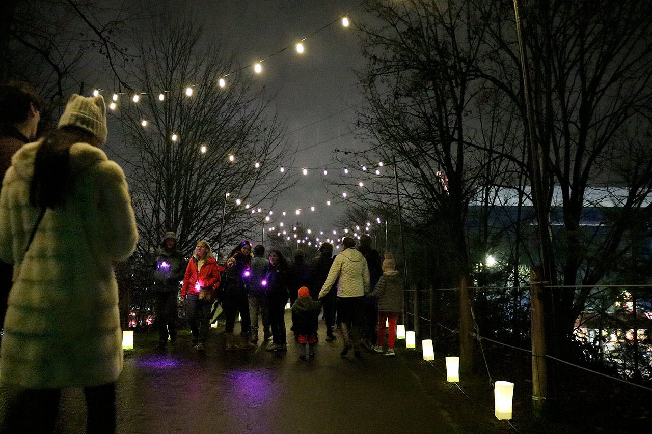 Crowds walked the enchanting luminary walk to Redmond Town Center, along the Redmond Central Connector trail. Stephanie Quiroz/staff photo