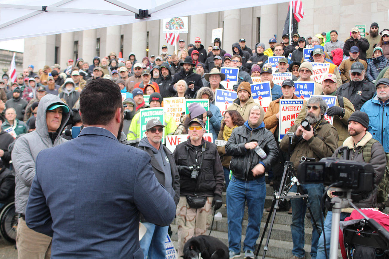 Matt Marshall, leader of the Washington Three Percenters gun rights group, addresses a crowd rallying for Second Amendment rights Jan. 17 at the state Capitol in Olympia. Marshall condemned Republican leadership in the House of Representatives, which expelled Rep. Matt Shea from the Republican Caucus. Marshall announced his candidacy for the 2nd District seat held by House Minority Leader J.T. Wilcox. Photo by Cameron Sheppard, WNPA News Service