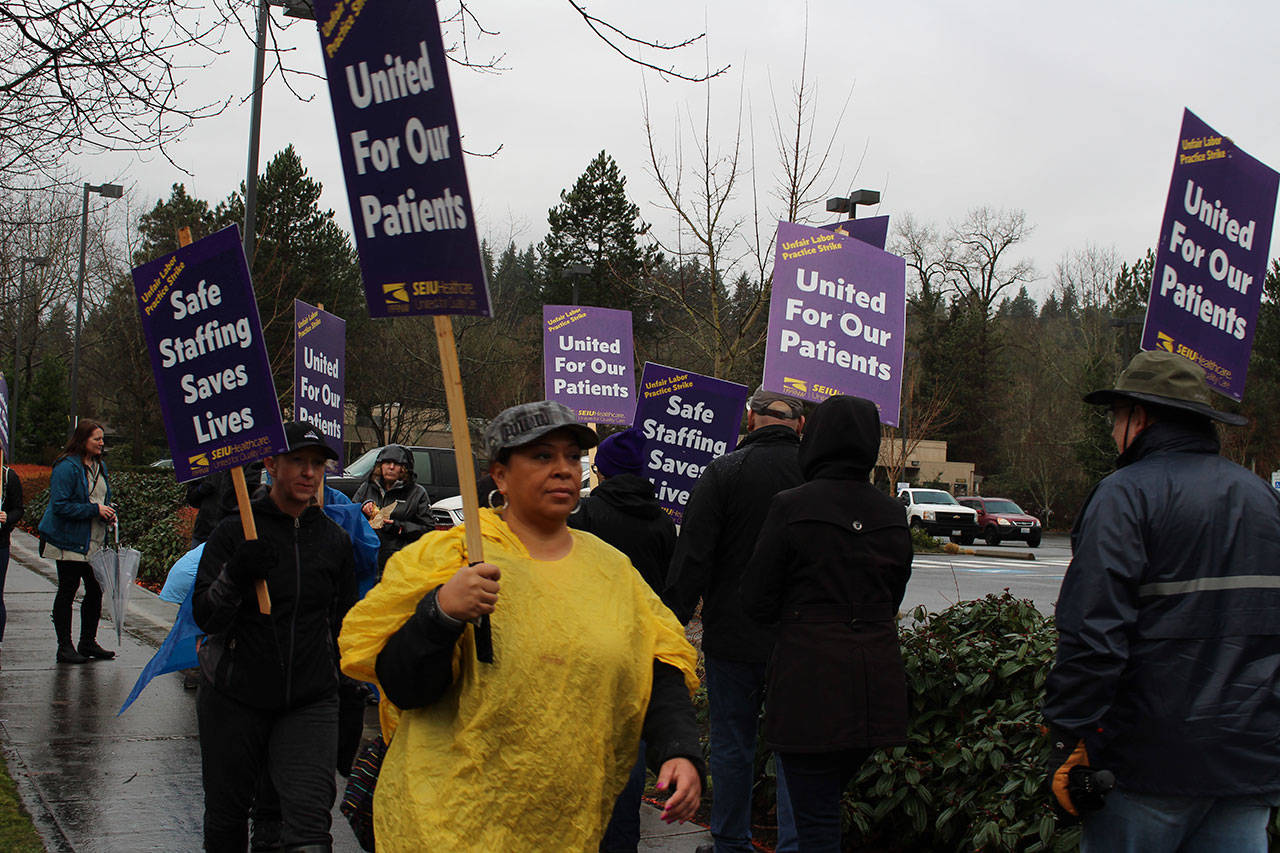 In addition to nurses, nursing assistants, techs, lab workers, dietary workers, environmental service technicians, clerks and social workers are among the strikers. Samantha Pak/staff photo