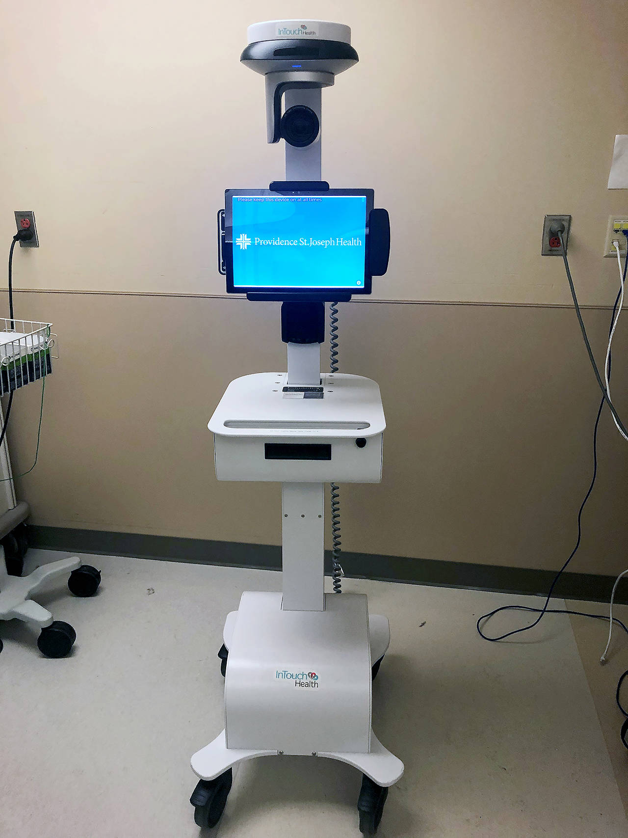 A robot helps treat the Snohomish County man in his 30s with coronavirus who since Monday has been in an isolated room at Providence Regional Medical Center Everett. Not shown is the robot’s stethoscope and microphone so the patient can talk with the doctor, who is not in the room. (Providence Regional Medical Center)