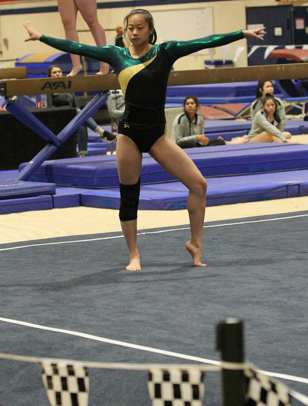 Ashley He competes on the floor exercise this season. Courtesy photo