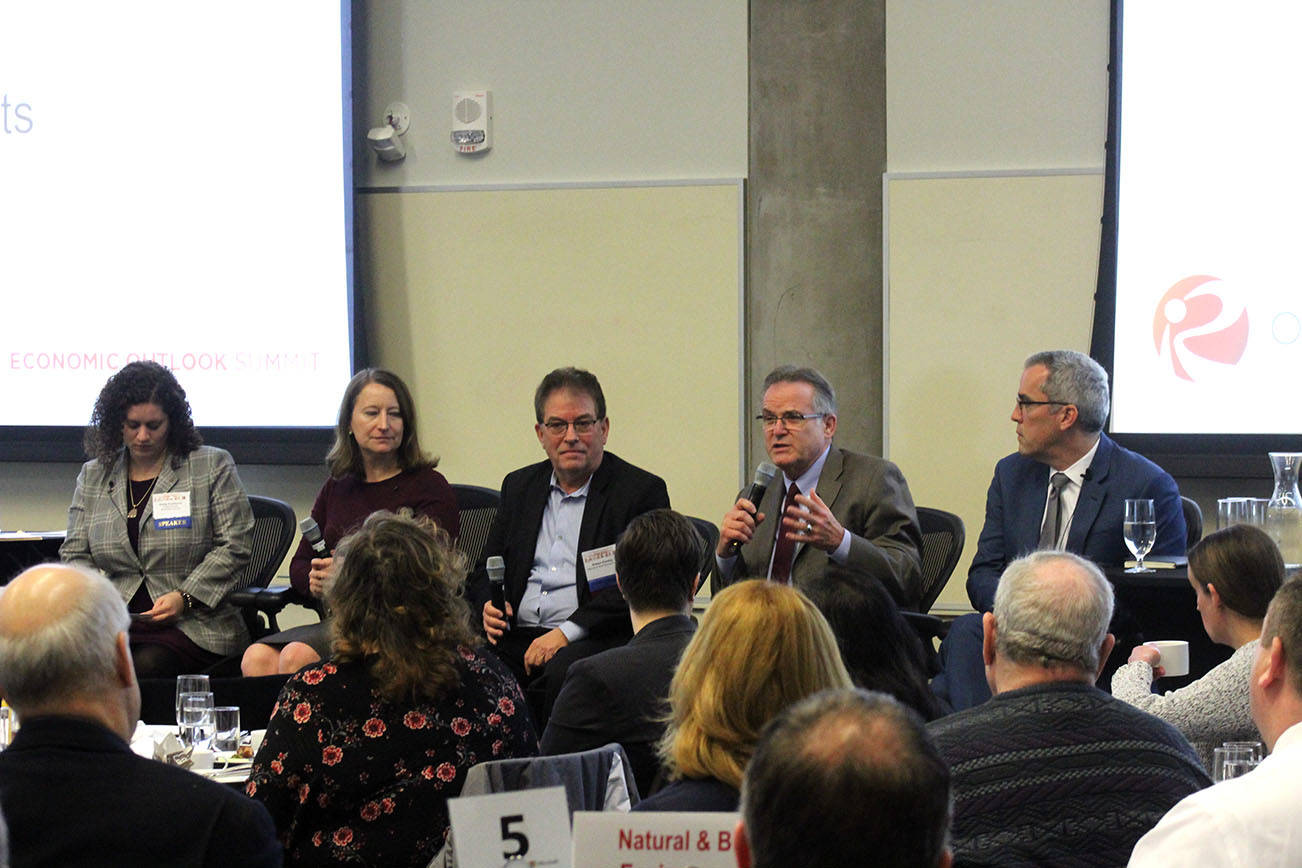 Mitchell Atencio/staff photo                                 From left, Emily Parkhurst, Amy Carlson, Robert Pantley, Jerry Weber and Chris Mefford answer questions during their panel discussion at OneRedmond’s Eastside Economic Outlook Summit on Feb. 26 in Redmond.
