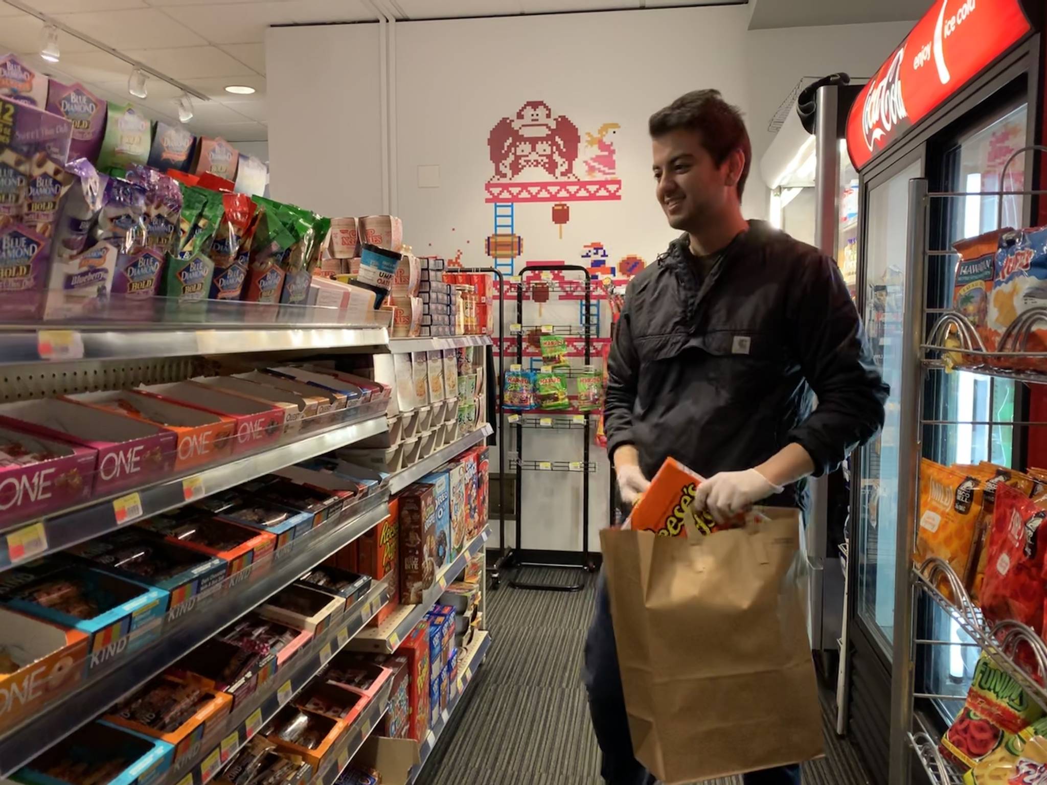 Alex Comair, director of operations, shops at the DigiPen student store for a delivery. Photo courtesy of DigiPen Institute of Technology