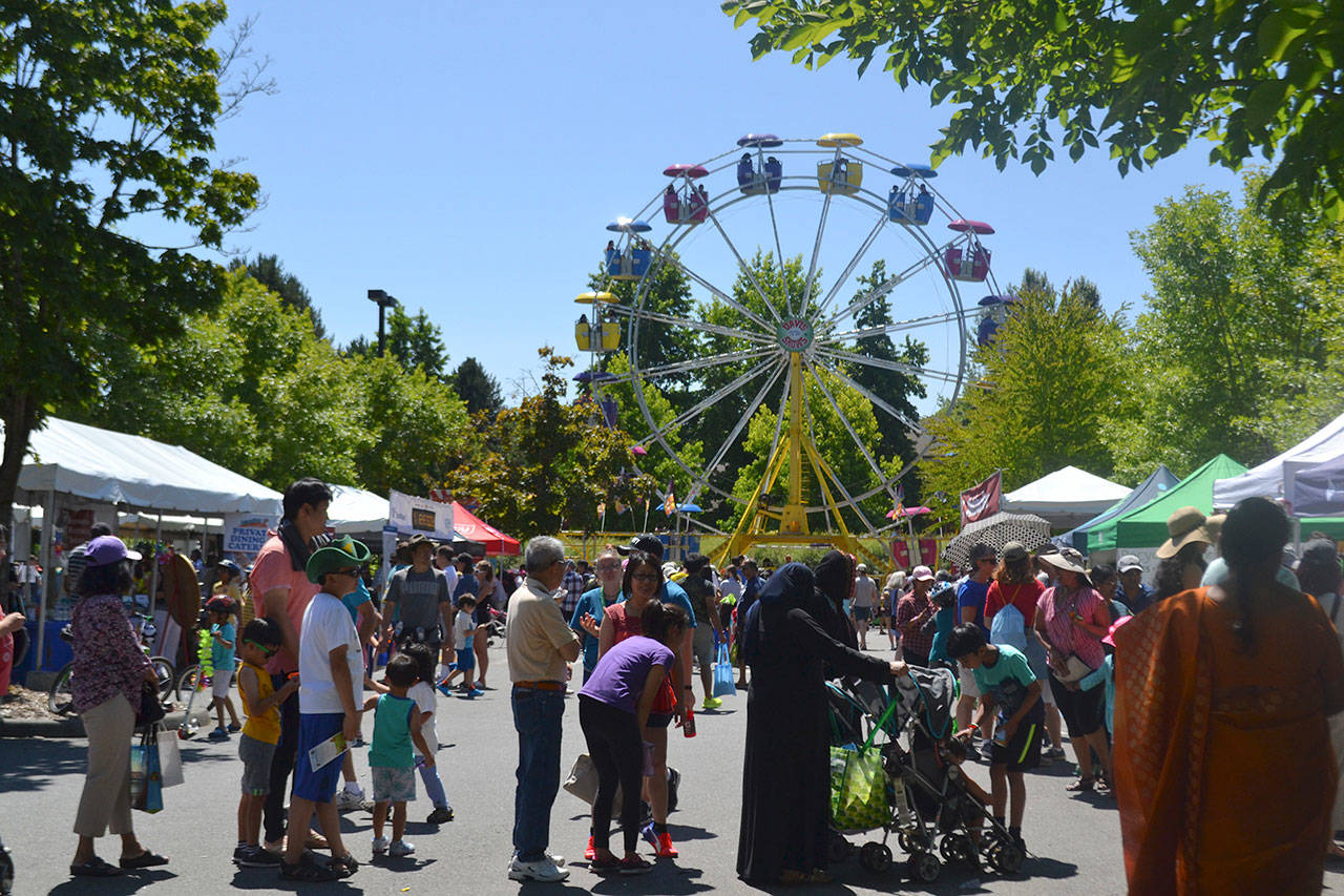 Festival goers at a previous Redmond’s Derby Days enjoy carnival rides and more. File photo