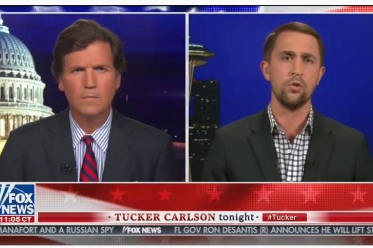 Critical race theory became a political buzzword last fall after Gig Harbor resident Christopher Rufo (right) joined commentator Tucker Carlson on Fox News. (Screenshot from YouTube broadcast)