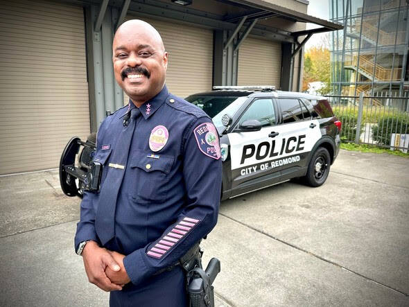 Redmond Police Chief Darrell Lowe shows off his pink Redmond shoulder patch. Courtesy of the city of Redmond.