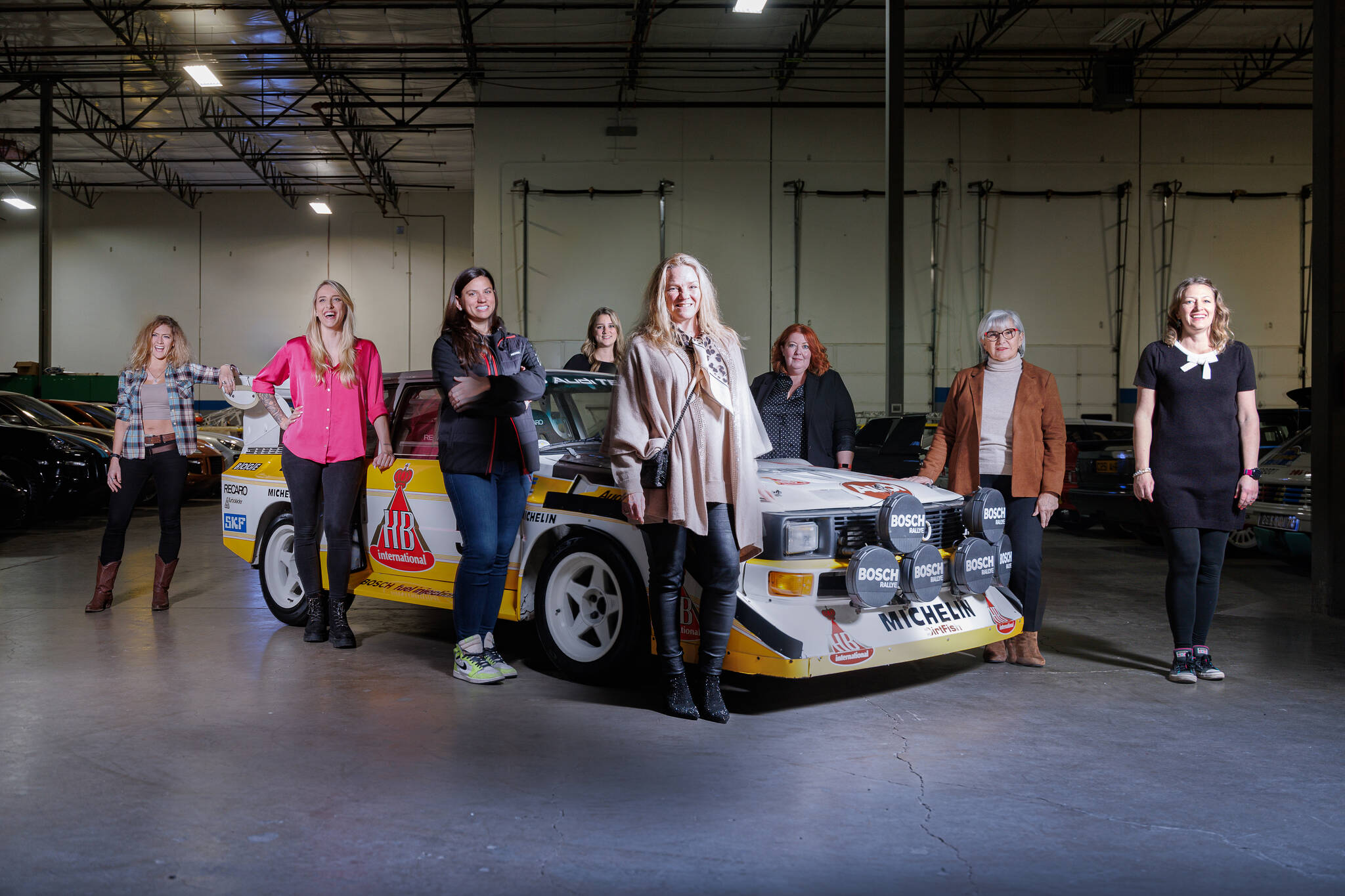 Left to right: (front) Vanessa Ruck, professional motorcycle racer; Jndia Erbacher, Top Fuel drag racer; Michele Abbate, American Trans-Am driver; Pernilla Solberg, rally car driver, co-driver and team manager; (back) Josie Rimmer WIM founder, Becs Williams, lead World Rally Car all live commentator; Michèle Mouton, “legend of rally” and World Rally Car Event Champion; and Michelle Miller, rally car driver, co-driver and DirtFish senior instructor. Photo courtesy of Karl Noakes