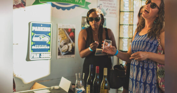 Each participating business hosts a winery and an artist, creating a walking tour of art and wine. Photo courtesy of Downtown Issaquah Association.