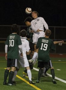 Bear Creek's Luke Blankenbeckler goes up for a header during a recent match against Shoreline Christian.