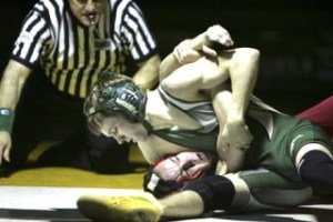 Redmond’s Nolan Thomas puts the clamp down on Newport’s Kevin Erickson during the Mustangs’ 51-24 win last Thursday. Thomas pinned Erickson in 49 seconds and improved to 14-3.