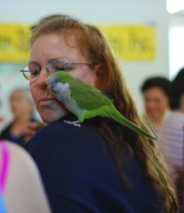 Nancy Brown of VCA Sno-Wood Animal Hospital in Woodinville gives her Sydney Quaker parakeet