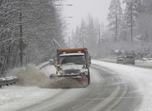 A city snow plow clears snow on Avondale Road during last week's snow storm. Many residents said they feel the city did a good job of clearing snow off the roads.