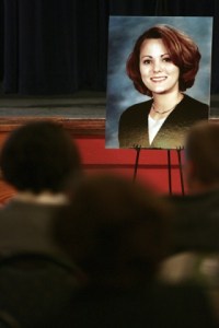 Community members packed the auditorium at the Old Redmond Schoolhouse Community Center to honor Melissa Batten and take a stand against domestic violence