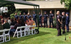 Members of the Redmond police and fire departments join others