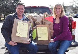 Rob and Carol Junglove with Home Team Real Estate of Redmond brought in more than 700 pounds of food last week.