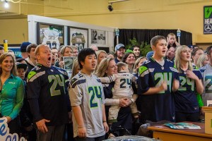 Seattle Seahawks fans get loud during a recent event at the Volume 12 store at Redmond Town Center.