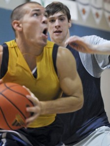 Lucas Peterson of The Bear Creek School (front) gets ready to drive to the hoop during an AAU team practice at the Eastside Basketball Club in Redmond on Tuesday