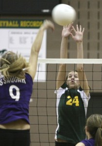 Redmond’s Rachel Rosen goes up for a block at the net during Tuesday’s loss against Issaquah High School at Redmond High School. The Eagles used their height advantage to win in four games