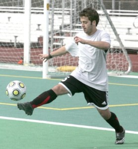 Redmond senior Felipe Barros works on his ball-handling during practice. Barros