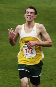 Redmond junior Mack Young crosses the finish line to win the Class 4A state boys cross-country title Saturday. His time was 15:18