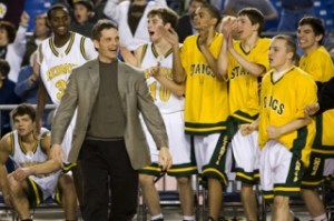 Redmond boys' basketball coach Jeff Larson is all smiles during the Class 4A state tournament after the Mustangs upset Mariner