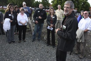 Seattle artist John Fleming discusses the art he has planned for the Redmond Central Connector at Thursday's Walk and Talk event in the downtown.