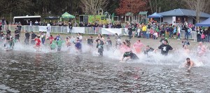 Polar Plunge participants hit the Lake Sammamish water at Idylwood Park last year.
