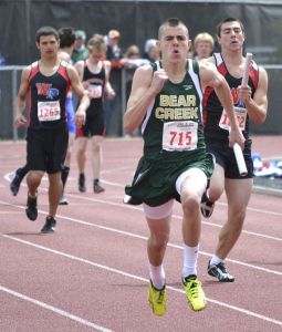 Bear Creek's Jesse Leuenberger competes in the 4x100 relay prelims at state.