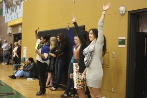 Redmond High students participate in the RESPECT assembly. Students stood or raised their hands if statements read aloud applied to them. Topics ranged from having siblings to worrying about their next meals.