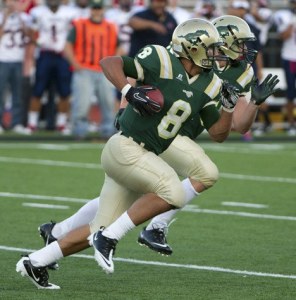 Redmond High quarterback Michael Conforto sprints downfield during the Mustangs' 41-7 loss to Juanita at home last Friday. Conforto provided his team's only score