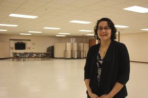 Pastor Cara Scriven stands in the basement of the Redmond United Methodist Church