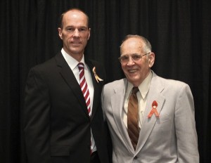Redmond Fire Department assistant fire marshal Todd Short (left) received the Medical Rescue award at the Red Cross's 16th Annual Heroes Breakfast Tuesday morning for assisting Don Trombly (right) who lost consciousness and stopped breathing in the Great Harvest Bread Company parking lot in Redmond.
