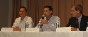 Redmond resident Andy Hill (center) answers a question at a forum for 45th Legislative District candidates Oct. 12 at Wilder Elementary in Woodinville. Hill is challenging incumbent Sen. Eric Oemig (left) from Kirkland. Also pictured (right) is Rep. Roger Goodman