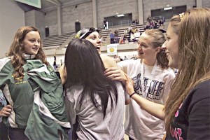 Redmond's Heather Harper overcame a year of heartbreak by winning gold in the 100-yard breaststroke in her senior season