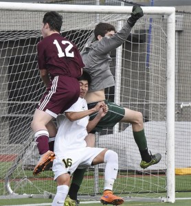 Redmond High goalkeeper Ryan Miller and defender Takanobu Suzuki