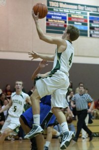 Bear Creek School senior Kyle Blankenbeckler goes to the hoop for two of his 13 points on Tuesday night against Rainier Christian. Blankenbeckler had a huge game