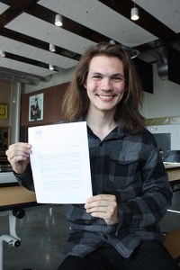 Redmond High School sophomore Levi Casto displays a letter from Georgia Prime Minister Irakli Garibashvili. The two corresponded for Casto’s project in his advanced placement world history class.
