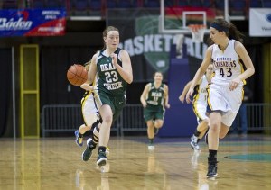 Bear Creek senior Kendall Engelstone races up the floor during the Grizzlies' 45-35 loss to Riverside Christian at the 2B state tournament in Spokane last Friday. In her final game for the Grizzlies
