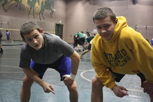 Redmond High junior wrestlers Chase Simmons