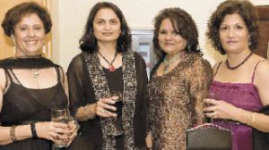Members of the Indian Community Eastside (ICE) pose at the fifth annual candlelight dinner and bench auction — Sitting Pretty for PACE. From left: Sita Vashee