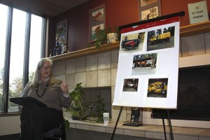 Acting street operations supervisor Robin Brown shares with attendees at the Redmond Senior Center's First Friday Coffee Chat some of the 'toys' she and her department get to play with on the job.