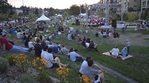 A large crowd enjoys the City of Redmond's “So Bazaar” urban night market on Aug. 7 along the Redmond Central Connector (RCC)