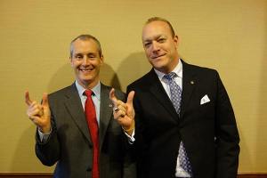 Current and upcoming Rotary Club of Redmond presidents Mike Nichols and Will Miller pose for the 'This Close' campaign to eradicate polio.