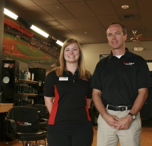 Redmond Sports Clip store manager Erika Denman and owner Rob Crandall said business has been good since the sports-themed